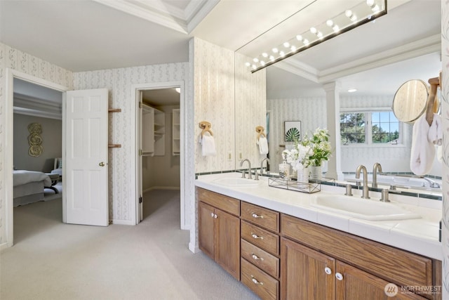 6222 139th Pl SE, Bellevue, WA 98006 - ensuite bathroom with wallpapered walls, double vanity, crown molding, decorative columns, and baseboards