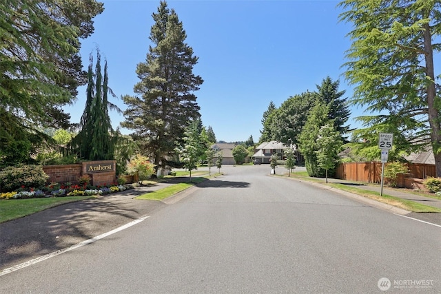 6222 139th Pl SE, Bellevue, WA 98006 - view of asphalt road featuring traffic signs, sidewalks, and curbs