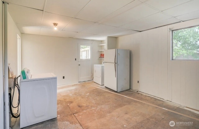 laundry area with healthy amount of natural light and independent washer and dryer