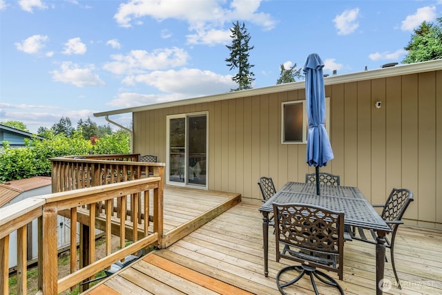 deck featuring outdoor dining space