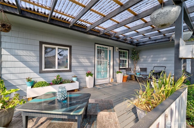 804 Pacific Ave N, Long Beach, WA 98631 - deck featuring outdoor dining area and a pergola