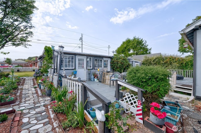 804 Pacific Ave N, Long Beach, WA 98631 - back of house featuring a wooden deck and fence