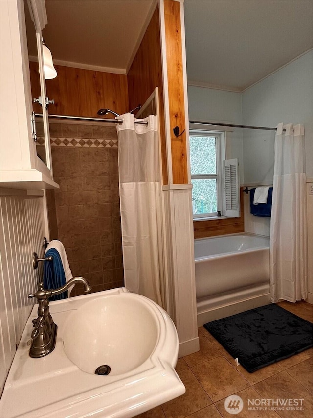 1133 Parkridge Dr, Port Townsend, WA 98368 - full bathroom featuring tile patterned flooring, a tub to relax in, a shower with shower curtain, crown molding, and a sink