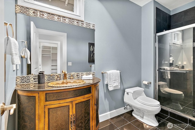 1038 Belfair Rd, Bellevue, WA 98004 - full bath with toilet, a shower stall, vanity, tile patterned flooring, and baseboards