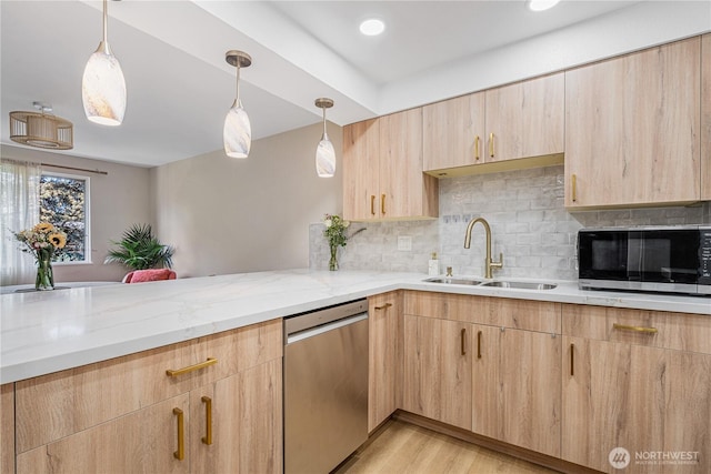 15623 NE 18th St Unit D201, Bellevue, WA 98008 - kitchen with appliances with stainless steel finishes, light brown cabinets, a sink, light stone countertops, and recessed lighting