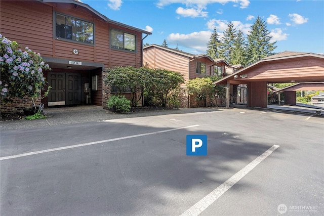 15623 NE 18th St Unit D201, Bellevue, WA 98008 - view of partially covered parking lot