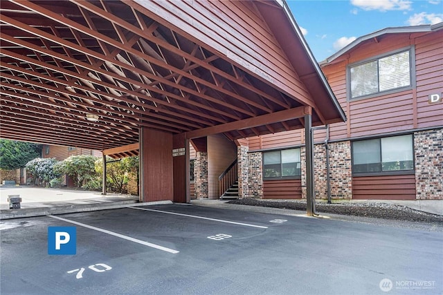 15623 NE 18th St Unit D201, Bellevue, WA 98008 - covered parking lot featuring stairway