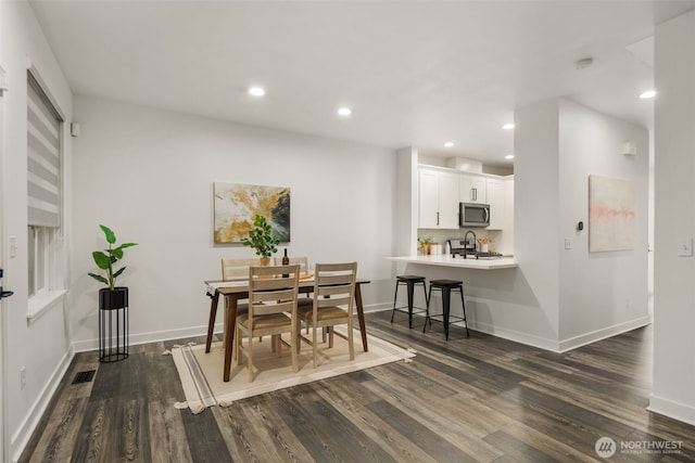 829 232nd Pl NE, Sammamish, WA 98074 - dining space with dark wood-style flooring, recessed lighting, and baseboards