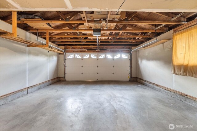 garage featuring a garage door opener