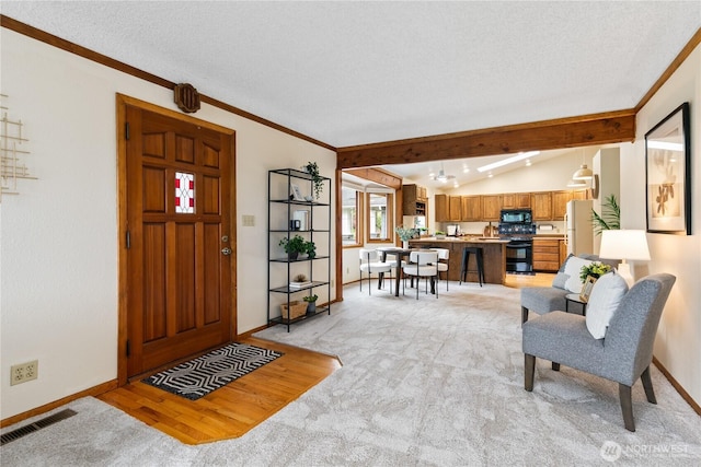 12013 Exeter Ave NE, Seattle, WA 98125 - foyer entrance featuring baseboards, a textured ceiling, light colored carpet, and crown molding