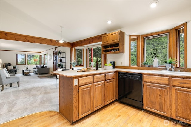 12013 Exeter Ave NE, Seattle, WA 98125 - kitchen featuring black dishwasher, a sink, lofted ceiling, healthy amount of natural light, and recessed lighting