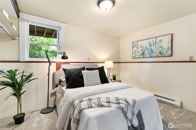 12013 Exeter Ave NE, Seattle, WA 98125 - carpeted bedroom with a baseboard heating unit