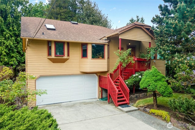 12013 Exeter Ave NE, Seattle, WA 98125 - ranch-style house with a garage, roof with shingles, concrete driveway, and stairway