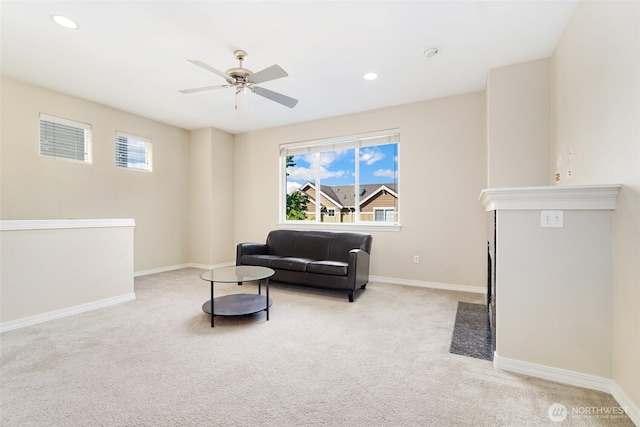 sitting room featuring carpet flooring, ceiling fan, baseboards, and recessed lighting