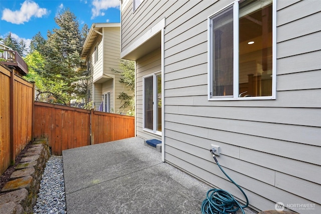 24045 40th Ln SE, Bothell, WA 98021 - view of side of home with fence and a patio area