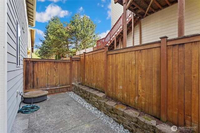 view of patio with fence