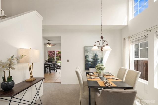 24521 SE 275th St, Maple Valley, WA 98038 - carpeted dining room featuring baseboards, ceiling fan, and a chandelier