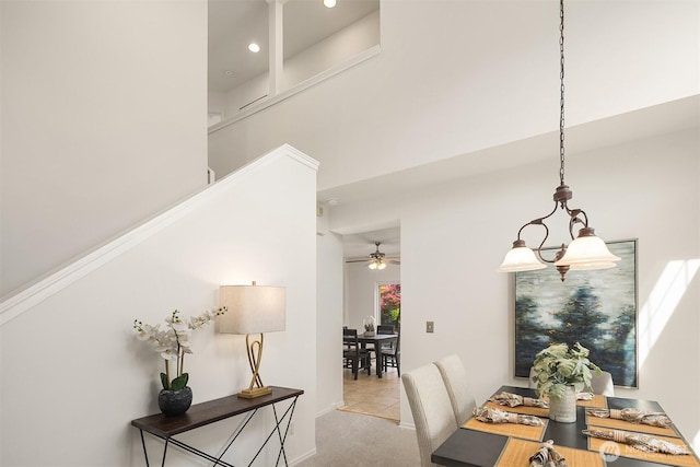24521 SE 275th St, Maple Valley, WA 98038 - dining space featuring recessed lighting, ceiling fan, carpet floors, and a towering ceiling