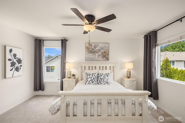 24521 SE 275th St, Maple Valley, WA 98038 - carpeted bedroom with baseboards and a ceiling fan