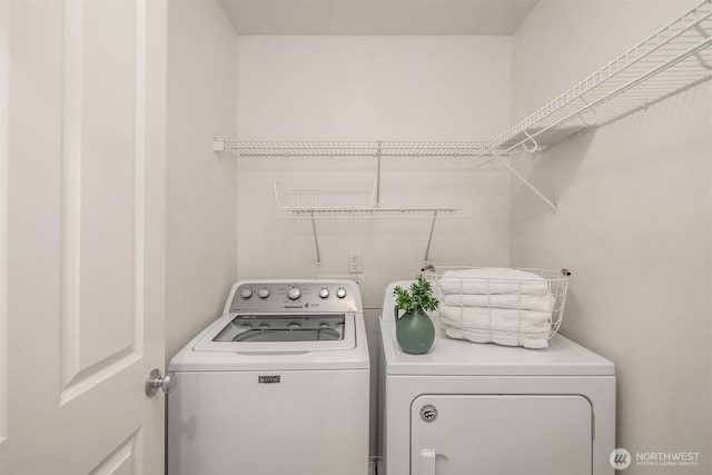 24521 SE 275th St, Maple Valley, WA 98038 - laundry room featuring washer and clothes dryer
