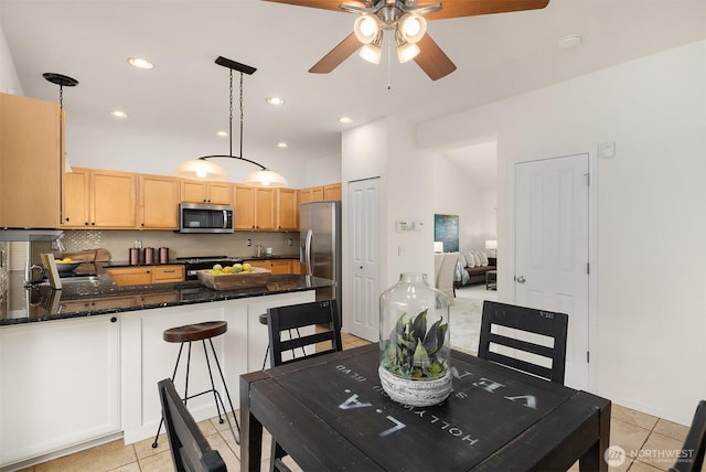 24521 SE 275th St, Maple Valley, WA 98038 - dining room with ceiling fan, light tile patterned flooring, and recessed lighting