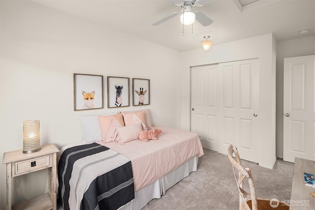 24521 SE 275th St, Maple Valley, WA 98038 - bedroom featuring light carpet, a closet, and a ceiling fan