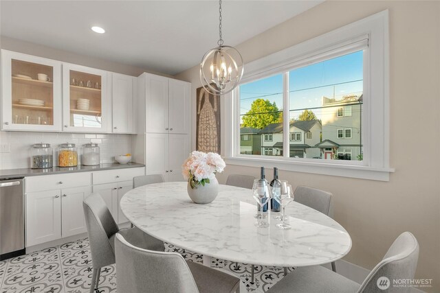 3202 NW 70th St, Seattle, WA 98117 - dining space with a chandelier, recessed lighting, and baseboards