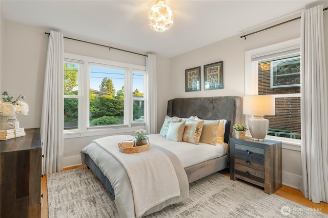 3202 NW 70th St, Seattle, WA 98117 - bedroom with light wood-style floors and baseboards