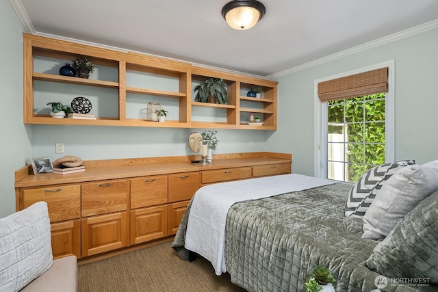 bedroom featuring ornamental molding and dark colored carpet