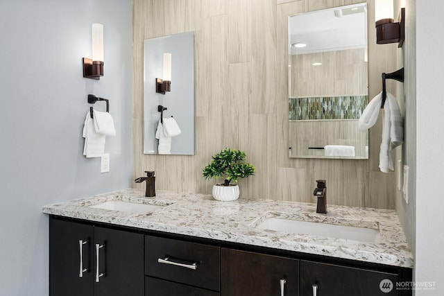 full bathroom featuring double vanity
