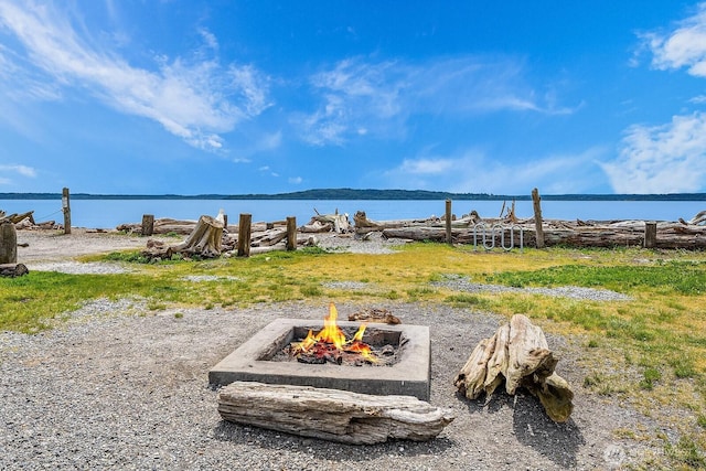 water view with a fire pit