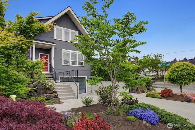 contemporary home featuring stairs and stucco siding