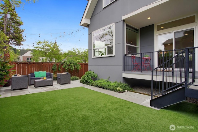 view of yard with an outdoor hangout area and a patio area