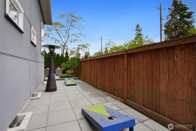 view of patio with fence