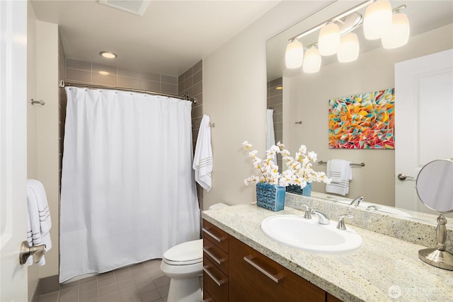 full bathroom with tile patterned floors, vanity, toilet, and a shower with curtain