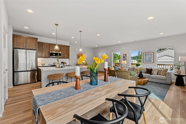 81 E Compass Ln, Allyn, WA 98524 - dining area featuring light wood-style flooring and recessed lighting