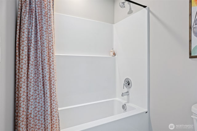 81 E Compass Ln, Allyn, WA 98524 - bathroom featuring toilet and shower / bath combo with shower curtain