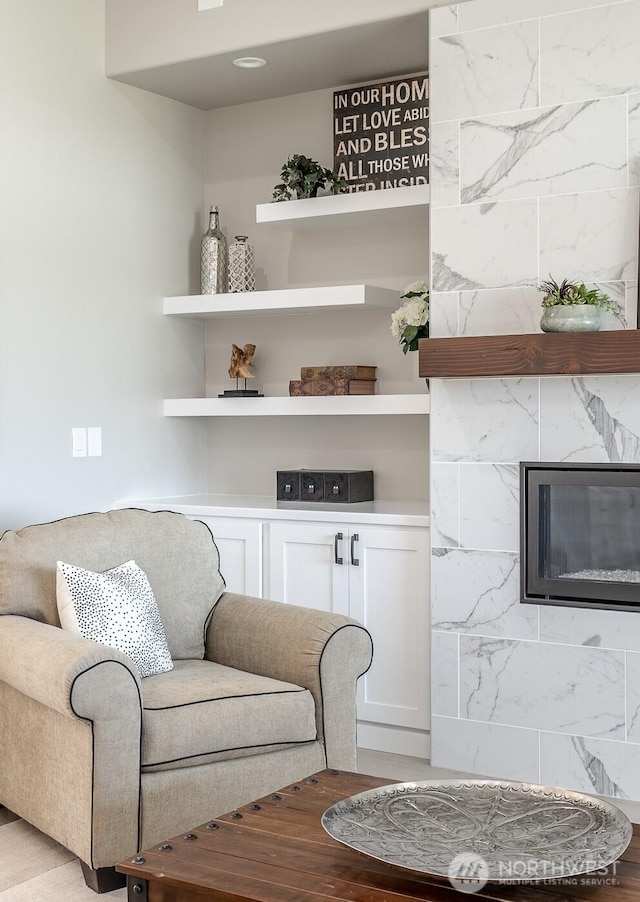1196 8th Ave NE, Ephrata, WA 98823 - living room featuring a fireplace and wood finished floors