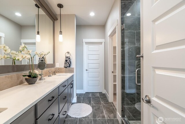 1196 8th Ave NE, Ephrata, WA 98823 - full bathroom with double vanity, a stall shower, and recessed lighting