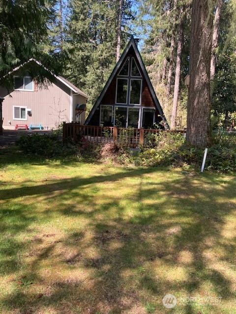 411 N Duckabush Dr E, Hoodsport, WA 98548 - back of house with a lawn
