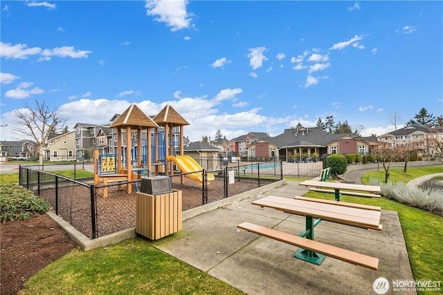 13405 97th Ave E Unit 107, Puyallup, WA 98373 - community play area with a residential view and fence