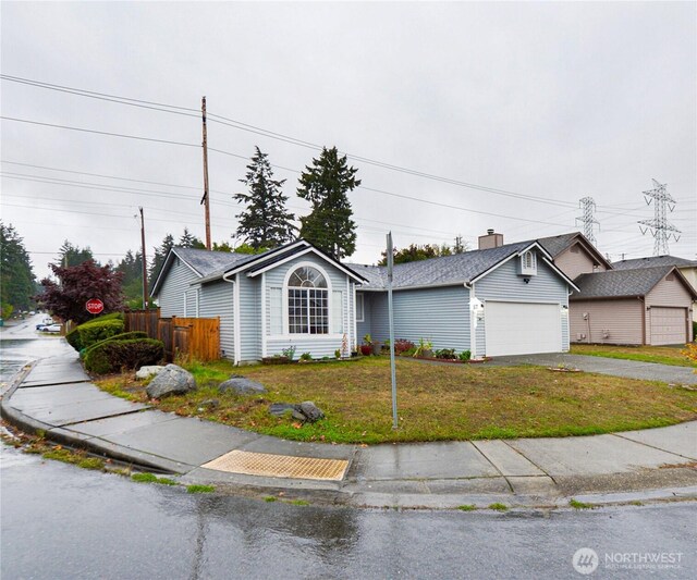 1307 SW 355th Pl, Federal Way, WA 98023 - single story home with driveway and an attached garage