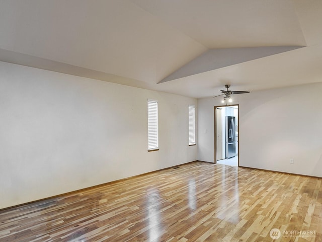 1307 SW 355th Pl, Federal Way, WA 98023 - unfurnished room featuring light wood-style floors, ceiling fan, and lofted ceiling