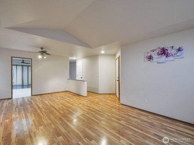 1307 SW 355th Pl, Federal Way, WA 98023 - unfurnished living room with light wood finished floors, vaulted ceiling, and a ceiling fan