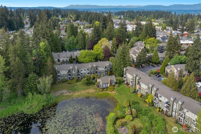 drone / aerial view of a water and mountain view