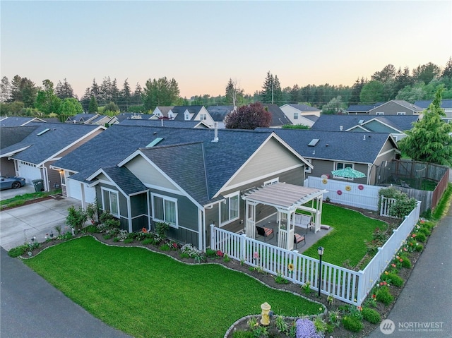 6540 Endeavor St, Ferndale, WA 98248 - view of front of property featuring a shingled roof, a residential view, driveway, a garage, and a pergola