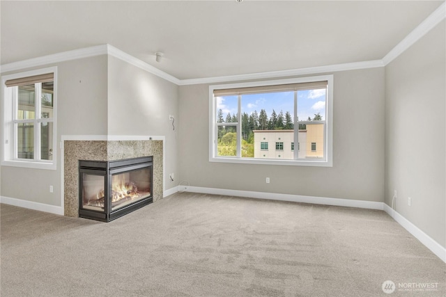 15408 Main St Unit 401, Mill Creek, WA 98012 - unfurnished living room featuring ornamental molding, carpet, a multi sided fireplace, and baseboards