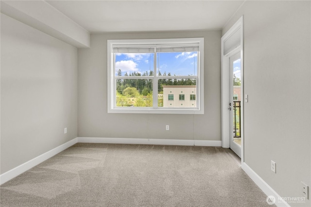 15408 Main St Unit 401, Mill Creek, WA 98012 - empty room featuring carpet flooring and baseboards