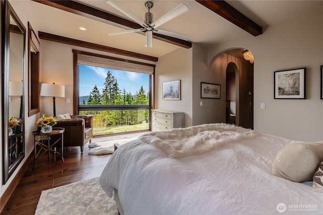 40 Eagle Ridge Dr, Cle Elum, WA 98922 - bedroom with beamed ceiling, arched walkways, and wood finished floors