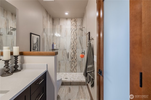 40 Eagle Ridge Dr, Cle Elum, WA 98922 - bathroom with walk in shower, toilet, vanity, and recessed lighting